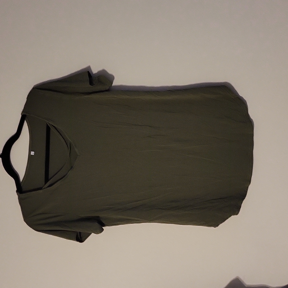 Army green V-neck shirt.
